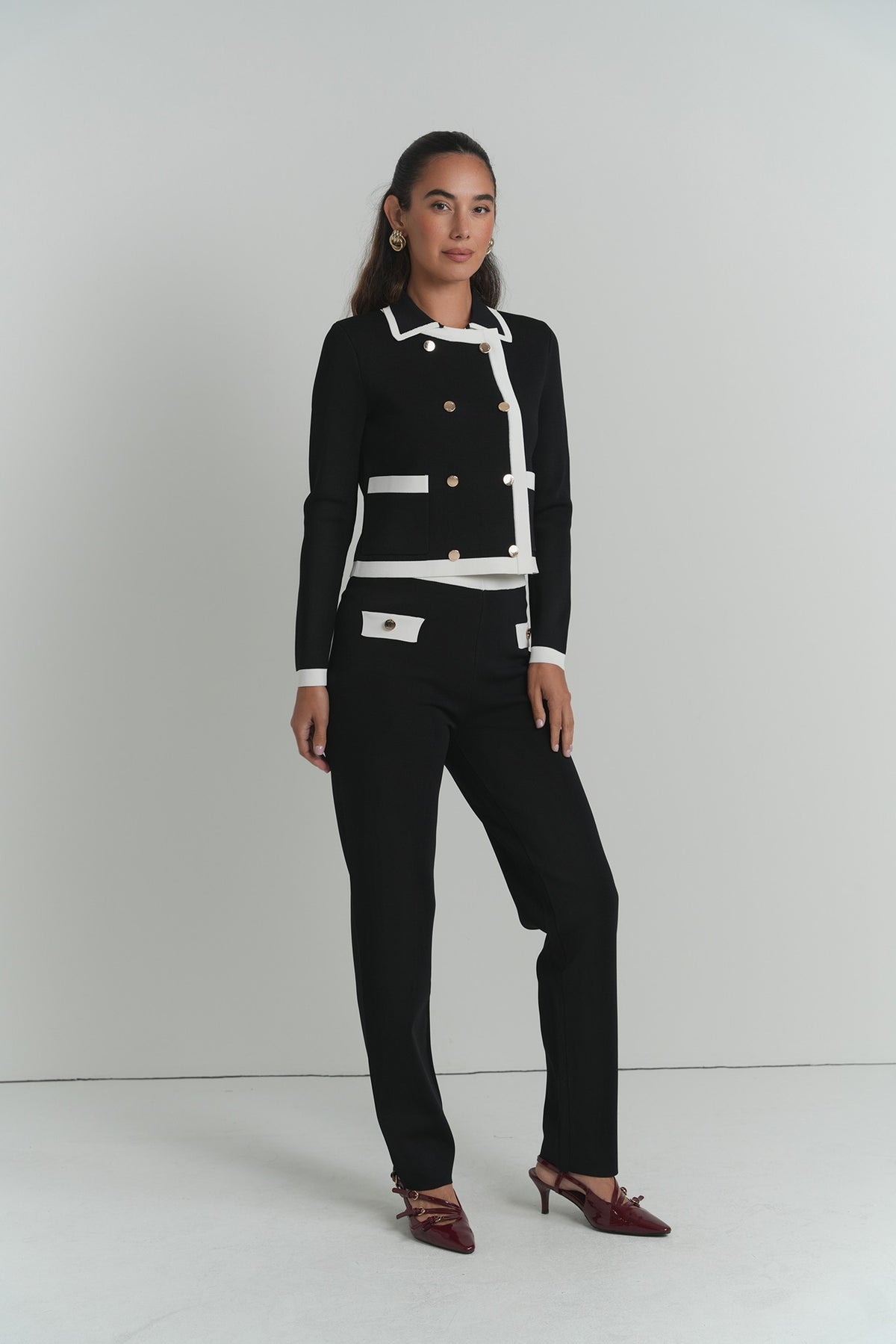 The Elodie Contrast Pants in Black With Ivory Edge – on model – ALEEZA PARIS