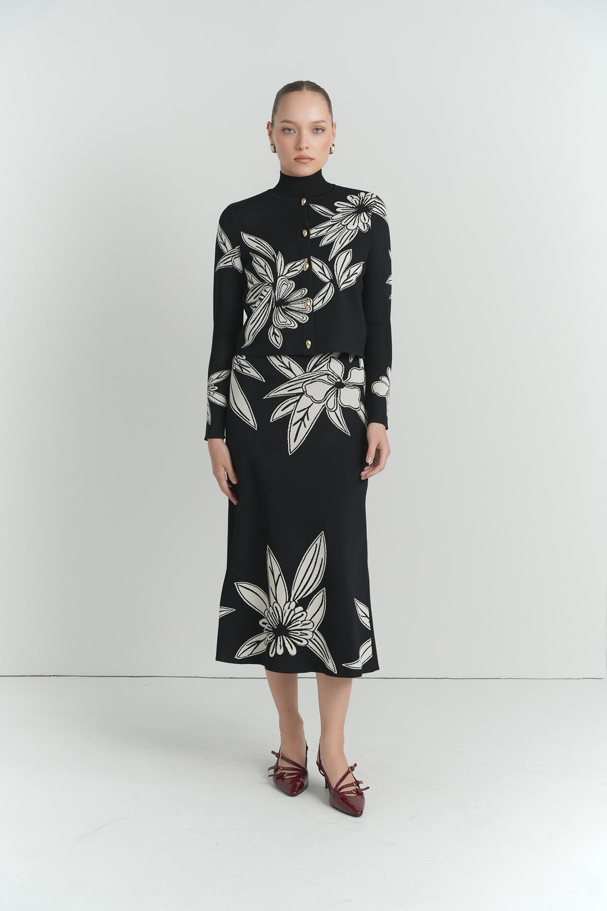 Sketch Floral Knit Top in Black With Cream Flowers – on model – ALEEZA PARIS