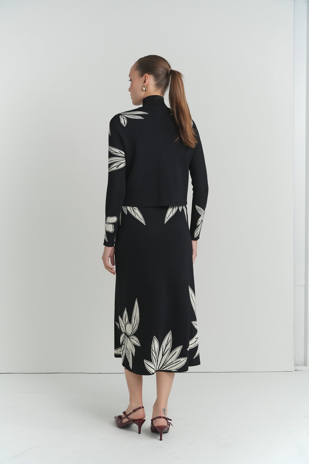 Sketch Floral Knit Top in Black With Cream Flowers – on model – ALEEZA PARIS