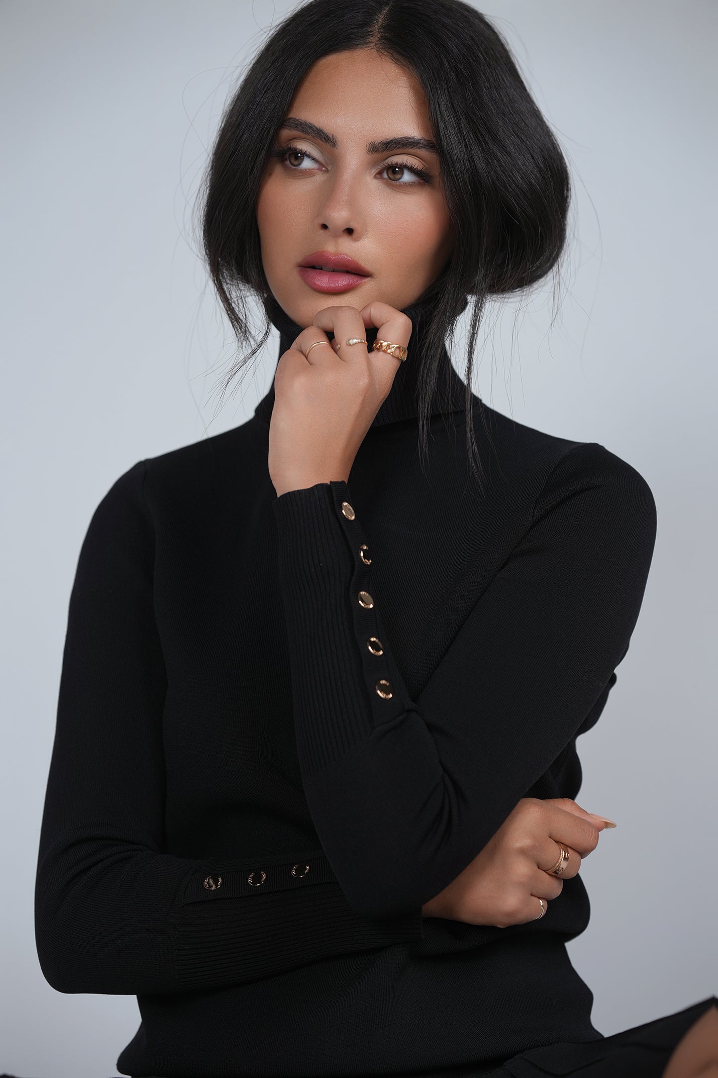 Black turtleneck shop with gold buttons