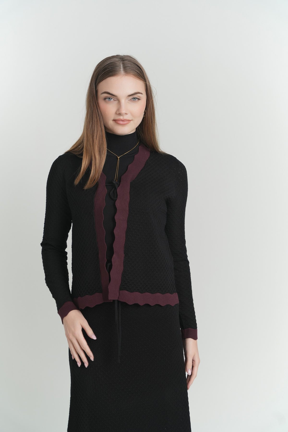 Marielle Trim Cardigan in Black With Plum Trim – on model – ALEEZA PARIS
