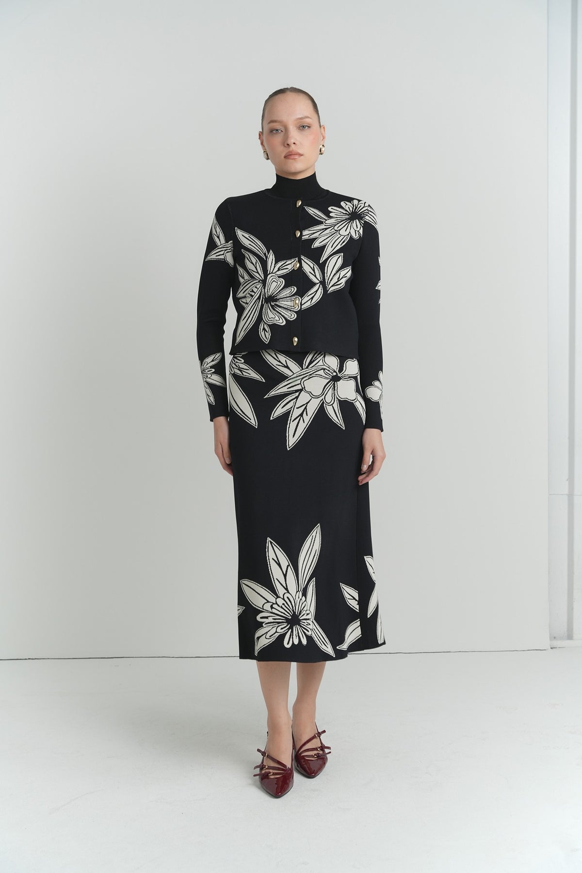 Sketch Floral Knit Top in Black With Cream Flowers – on model – ALEEZA PARIS