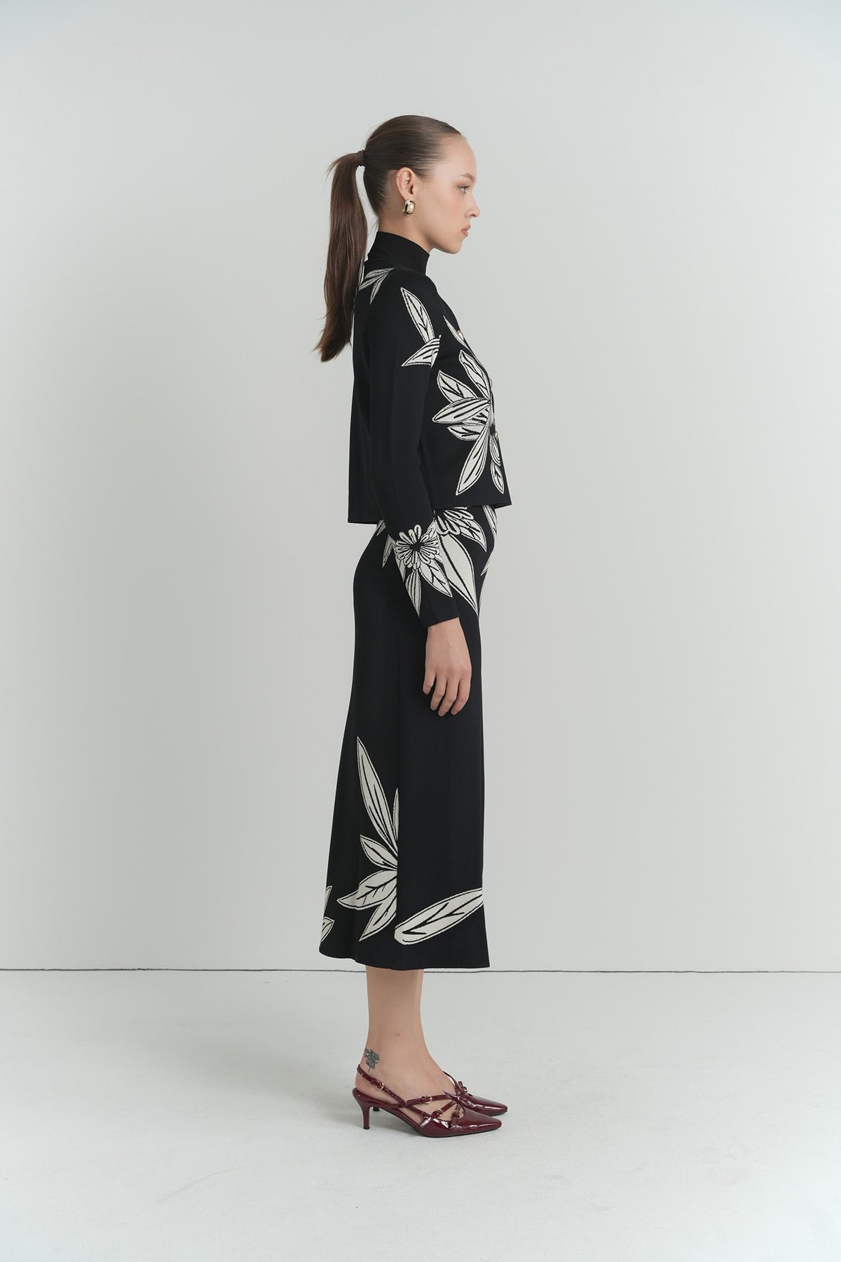 Sketch Floral Knit Top in Black With Cream Flowers – on model – ALEEZA PARIS