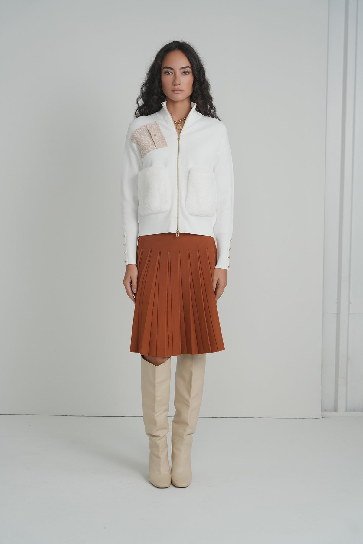 Pleated Wonder Skirt in Pumpkin – on model – ALEEZA PARIS